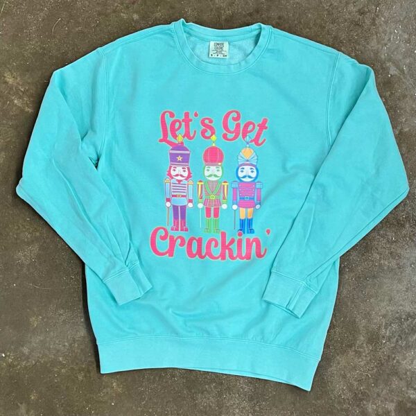 This Let's Get Crackin' Neon Nutcracker sweatshirt